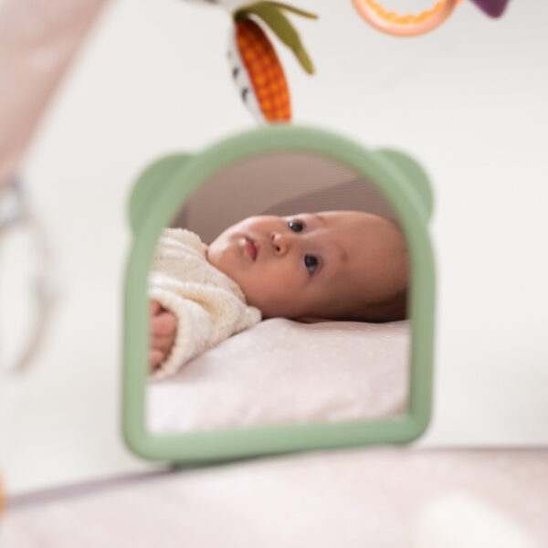 Taf Toys játszószőnyeg játékhíddal Tummy-time activity gym