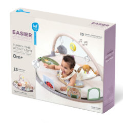Taf Toys játszószőnyeg játékhíddal Tummy-time activity gym